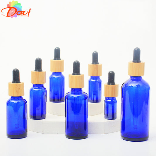 10PCS/LOT Blue Glass Dropper Bottle Natural Bamboo Cap Refill For Essence Massage Face Oil Aromatherapy Liquid Skincare